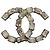Broche Chanel CC en métal doré et cristaux