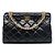 Borsa Shopping Chanel Reissue 2.55 in pelle di vitello craquelé lucida matelassé nera