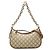 Borsa a catena piccola GG Supreme Emblem di Gucci