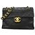 Borsa a tracolla Chanel in pelle d'agnello nera