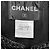 Giacca Chanel in tweed bouclé nero con bottoni logo CC - vista 4