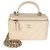 Piccola borsa vanity Chanel in pelle d'agnello matelassé beige con manico superiore e catena