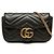 Gucci Mini GG Marmont Matelassè in pelle di vitello nera, borsa a tracolla con patta