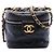 Vanity Beauty case Chanel in vitello matelassé nero con CC e catena