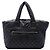 Bolso Tote reversible Coco Cocoon de nailon acolchado negro Medium Chanel