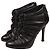 Botines Chanel Camelia de cuero negro