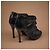 Botines Chanel Camelia de cuero negro - vista 6