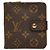 Cartera bi-fold compacta con cremallera Louis Vuitton Monogram