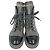 Stivaletti combat stringati Chanel CC in pelle grigia
