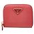 Monedero redondo con cremallera Prada Saffiano Triangle Plate