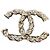 Spilla Chanel CC con perle e cristalli