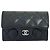 Tarjetero Chanel de piel de becerro granulada negra