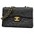 Borsa a tracolla Chanel in pelle di agnello nera