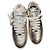 Sneakers Chanel da donna in pelle dorata
