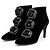 Stivaletti Chanel in velluto nero Camelia