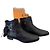 Botines de piel negra Tod's con flecos y hebilla
