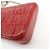 Borsa a tracolla con catena PRADA in pelle di capra nappa rossa 1BD140 - vista 13