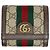 Cartera bi-fold Gucci Ophidia GG Supreme
