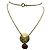Collana Chanel Lion placcata oro con perla rossa
