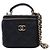 Chanel Mini Vanity Case CC Matelassé in Pelle d'Agnello Nera con Manico e Catena