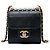 Chanel Mini Pochette Chic Pearls in Pelle di Capra Nera con Catena
