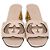 Sandali Gucci Slide in pelle rosa chiaro con G intrecciate traforate