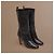 Chanel Botas de couro preto acolchoadas