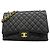 Borsa a tracolla Chanel in pelle di vitello grana nera