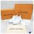 Louis Vuitton Baskets Timeout blanches avec patch en cuir - vue 7