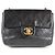 Chanel Mini Flap Bag pelle nera matelassé