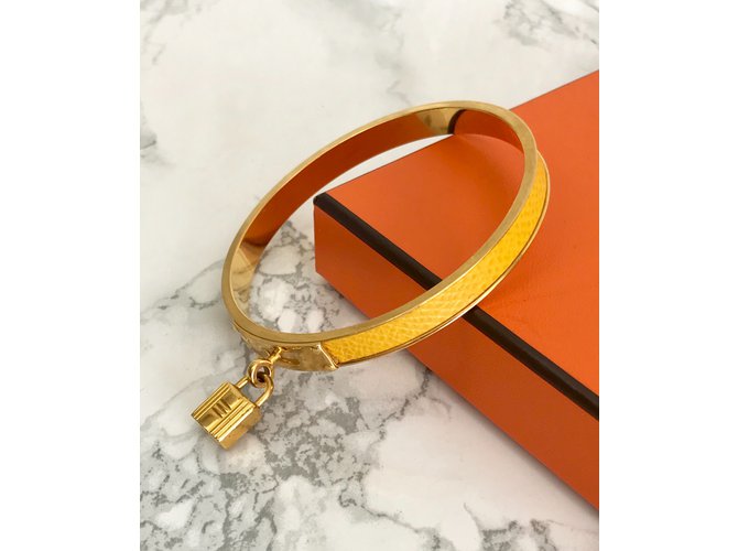Hermès Kelly bracelet Golden Yellow Leather Metal ref.72288 Joli Closet
