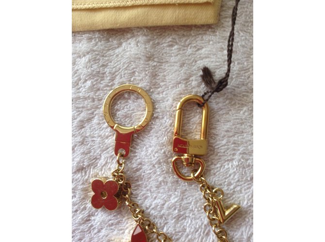Louis Vuitton Bag charms Golden Metal ref.75333 Joli Closet