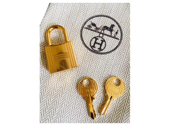 Hermès Golden Hermes padlock for Birkin or kelly bags, neuf 2 keys and