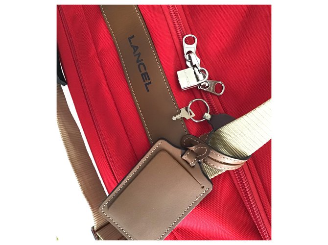 Lancel Sac de voyage Cuir Toile Rouge Marron clair ref.149945 - Joli Closet