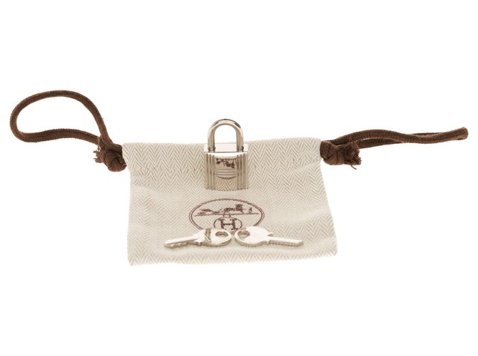 Cadenas Hermès Neuf (sans étiquette) Acier Palladié - 1 Clé - Pour Sac Kelly, Birkin