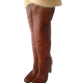 Miu Miu Botas de cano alto Marrom