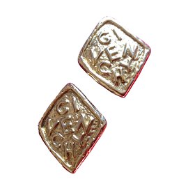 Givenchy Boucles d'oreilles clips dorées Doré