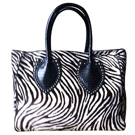 Alaïa Bolsos de mano Estampado de cebra