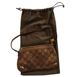 Gucci-Clutch bags-Golden
