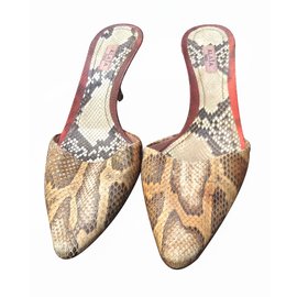 Alaïa Mules Python print