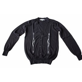 Sandro Strickjacke aus Wolle schwarz Schwarz