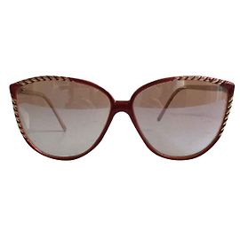 Nina Ricci Sonnenbrille Pink Golden