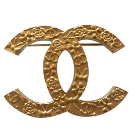 Chanel-Broche nuevo-Dorado