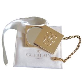 Autre Marque Ciondolo per borsa "Guerlain" D'oro
