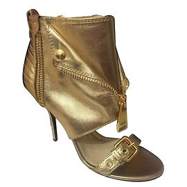 Moschino Botas de ouro Couture Dourado
