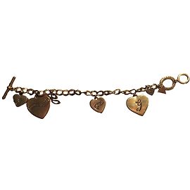 Pulseira Guess com charms dourada de metal Dourado