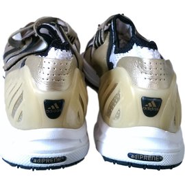 Stella Mc Cartney-scarpe da ginnastica-Nero,Bianco,D'oro