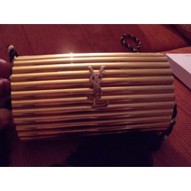 Yves Saint Laurent-Bolsas, carteiras, casos-Dourado