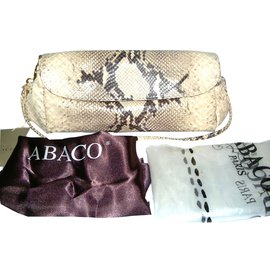 Abaco Clutch bags Python print