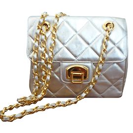 Charles Jourdan Bolsas Prata
